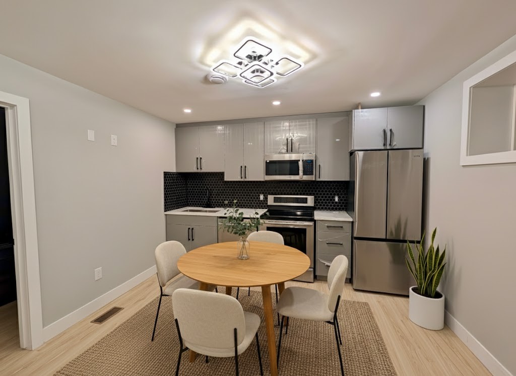 Open concept living and kitchen space with modern finishes